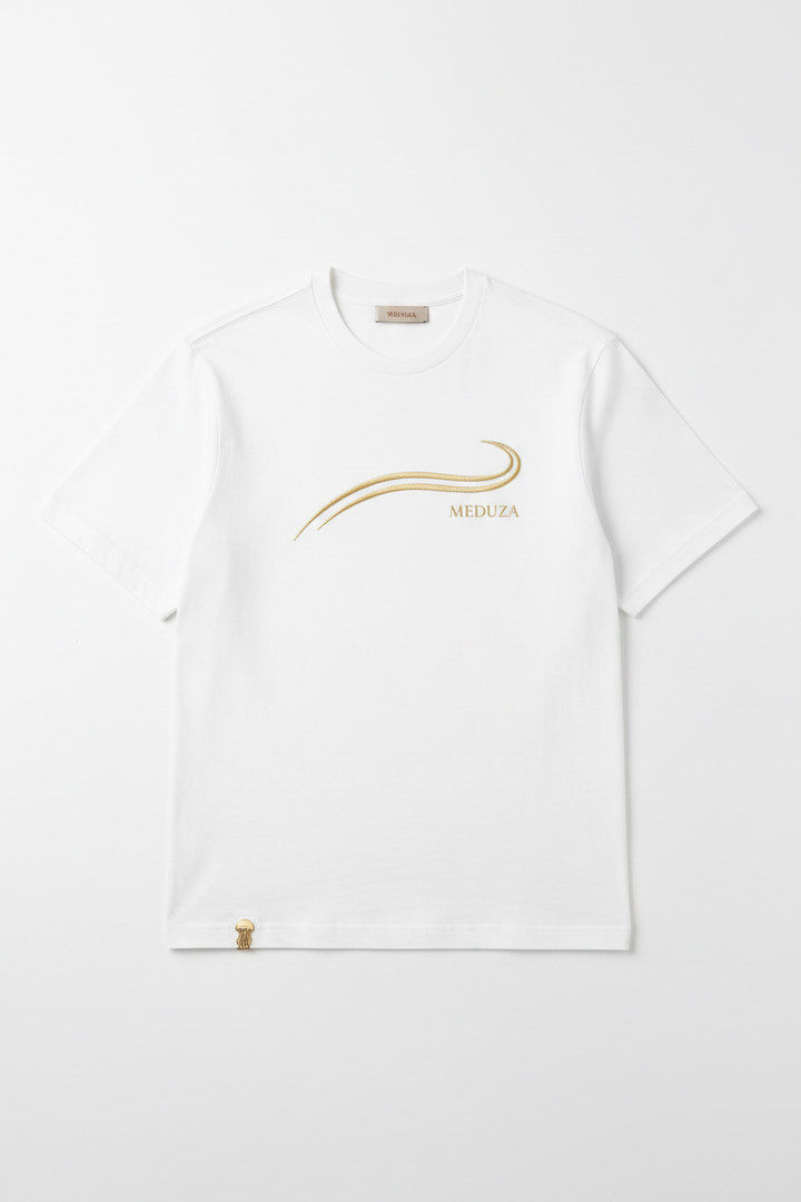 White luxury t-shirt with gold wave graphic and MEDUZA branding